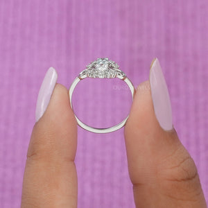 [A Women holding Oval Diamond Ring]-[Ouros Jewels]