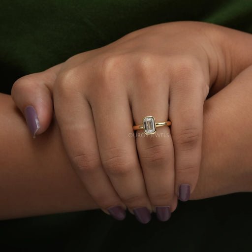 [A Women wearing Emerald Cut Lab Diamond Solitaire Ring]-[Ouros Jewels]