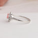 14k white gold shank of heart and round diamond cluster engagement ring