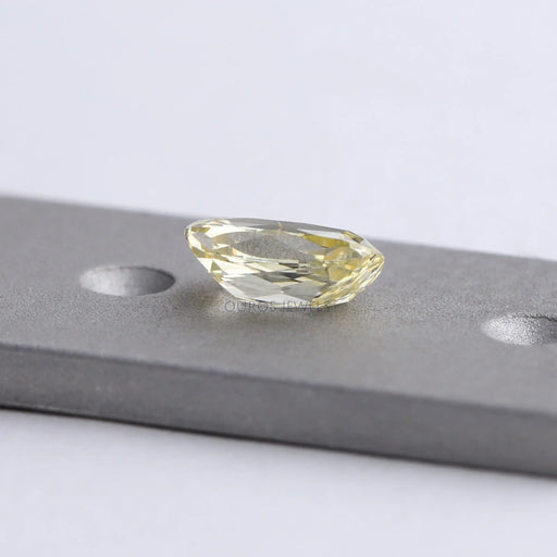 back view of vivid yellow old mine diamond elongated cushion cut