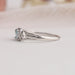 14k white gold split shank of green oval shaped lab made diamond engagement ring
