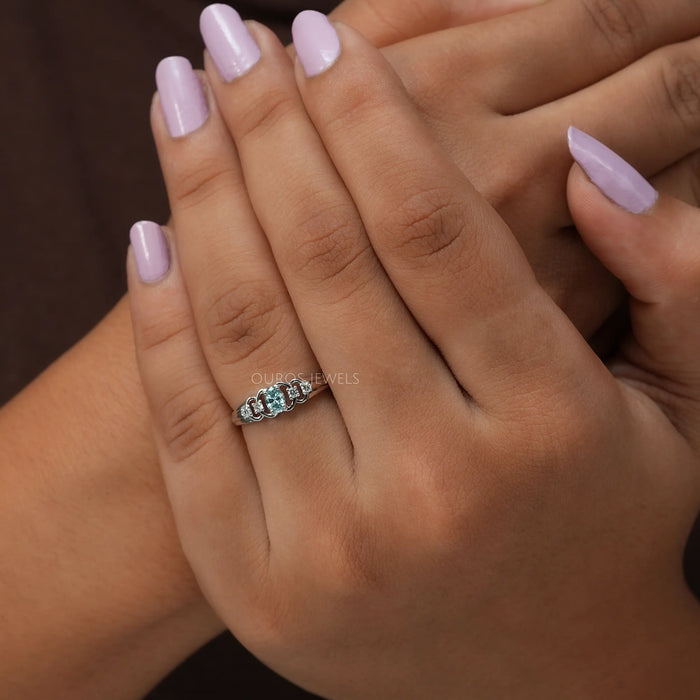Oval and round diamond five stone engagement ring in solid white gold