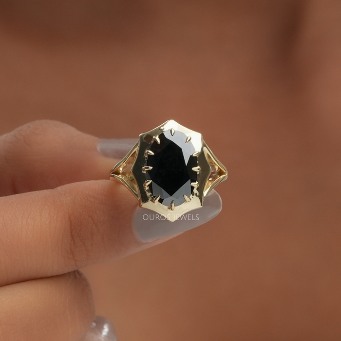 black diamond octagon shaped oval cut engagement ring 