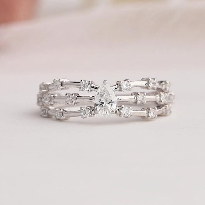 Three row split shank diamond wedding ring with stylish shank design 