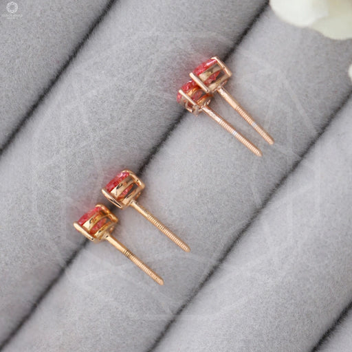 pink pear shaped diamond basket setting solitaire stud earrings rose gold