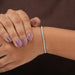 On hand look of round cut lab created diamond tennis bracelet