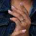 [On Finger Side View Of Three Diamond Engagement Ring Made In 14K Solid White Gold]-[Ouros Jewels]