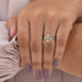 Front finger view of asscher cut diamond ring, center diamond color yellow with VS clarity.