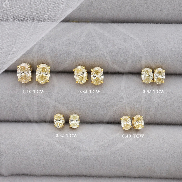 Brilliant oval cut lab created diamond solitaire earrings with claw prongs in different carat weights
