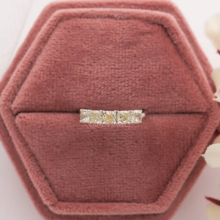 Five stone cushion cut ring crafted in yellow color and with VS clarity diamonds